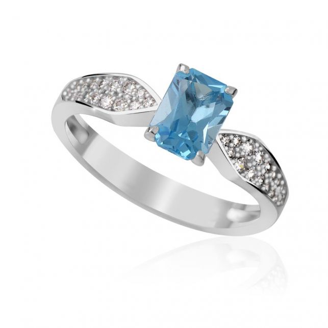 zlatý prsten s modrým topazem