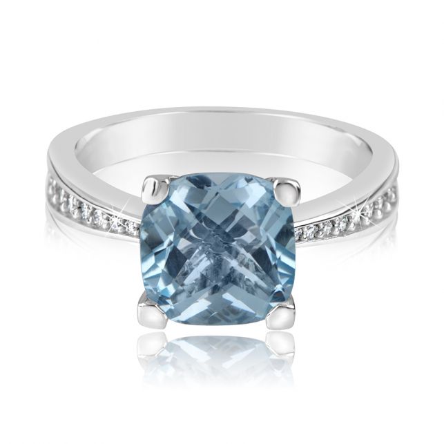 luxusní prsten s modrým topazem